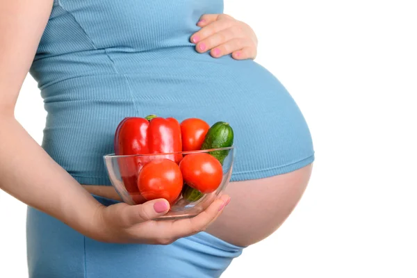 Mujer embarazada con verduras frescas —  Fotos de Stock