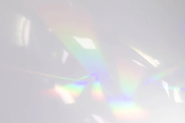 Textura de refracción de luz de arco iris borrosa en pared blanca — Foto de Stock