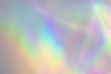 Beyaz duvarda bulanık gökkuşağı ışık kırılması dokusu