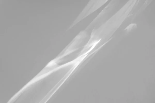 Sombra e efeito cáustico leve em uma parede branca — Fotografia de Stock