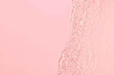 Pembe şeffaf berrak su yüzeyi dokusu yaz arkaplanı