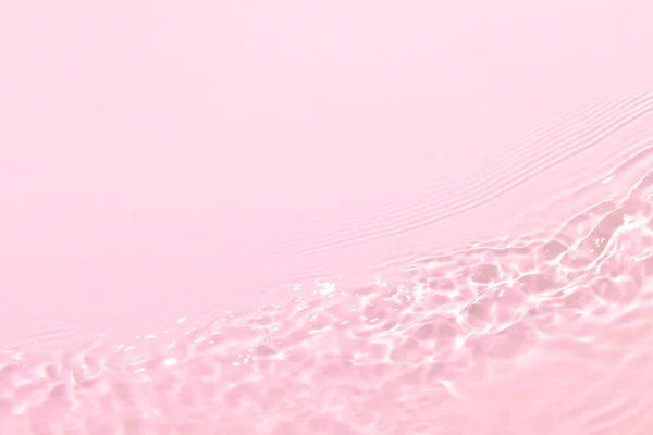 Rosa trasparente trasparente superficie dell'acqua texture estate sfondo — Foto Stock