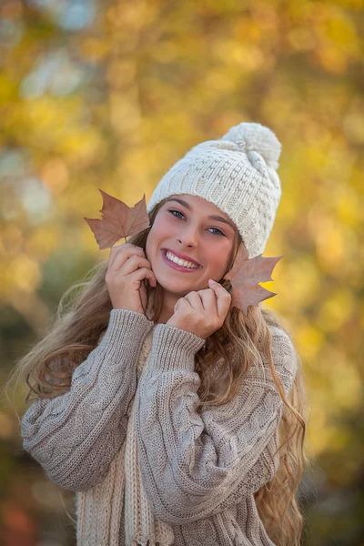 Happy smiling teeth in autumn — Stock Photo, Image