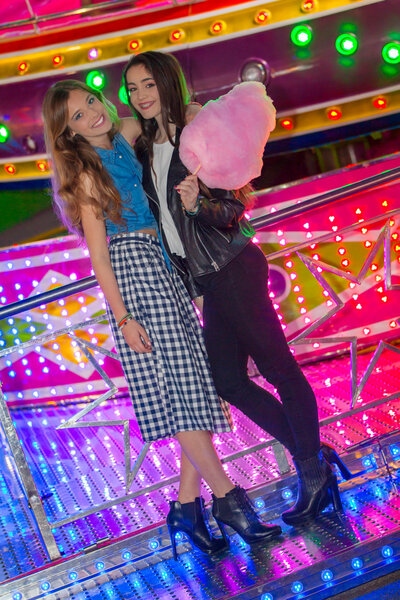 girls at the fair with candy floss