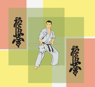 Karate ve bir hiyeroglif gösteren adam.