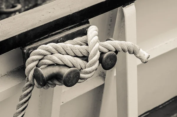 Rope tied to bollard sailboat, sepia — Stock Photo, Image