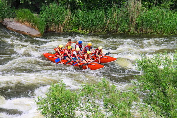 Rafting tourists with an experienced instructor on the river Sou