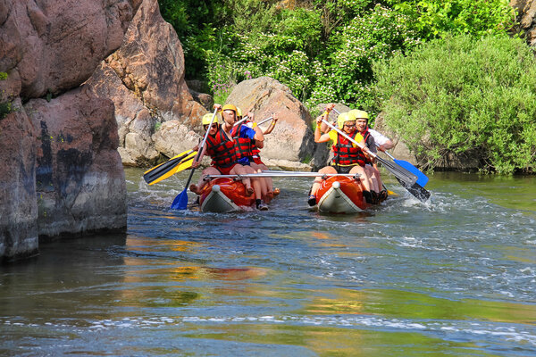 Rafting tourists with an experienced instructor on the river Sou