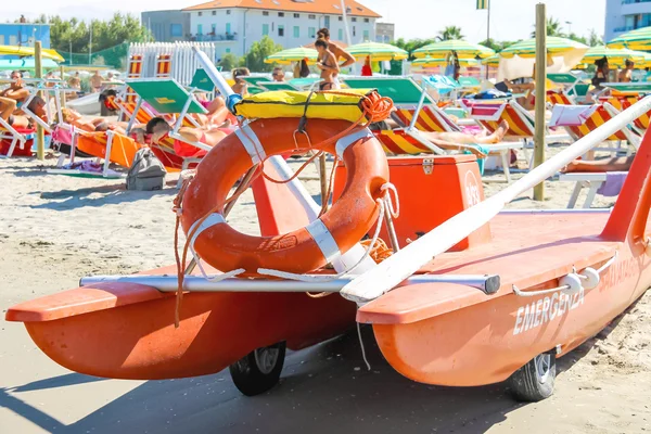 Safety equipment on the beach. Lifebuoy and a belt on catamaran — Stock Photo, Image