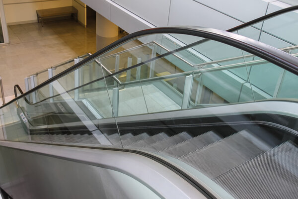 Modern escalator. Side view from top to down
