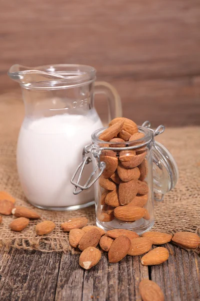 Almond milk with nuts — Stock Photo, Image