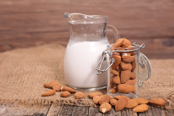 Almond milk with nuts — Stock Photo, Image