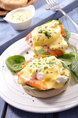 eggs benedict on English muffins clipart