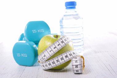 elma, halter, şerit metre