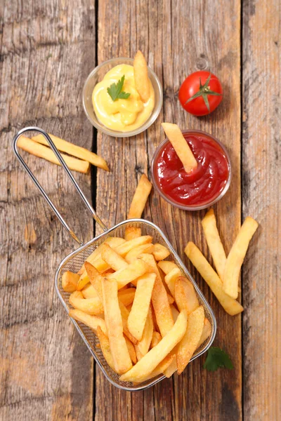 French fries and sauce — Stock Photo, Image