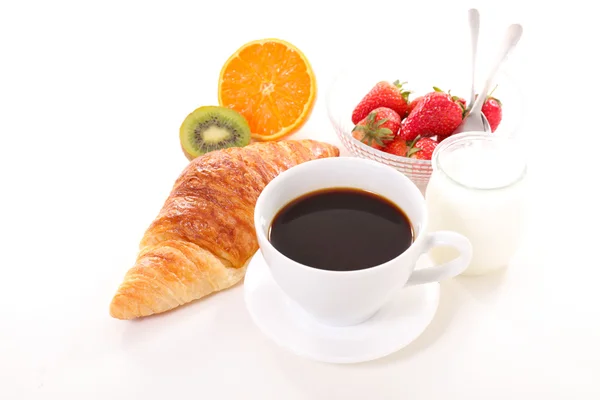 Kaffekopp, croissant och frukter — Stockfoto