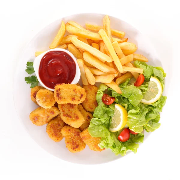 Nuggets, french fries and vegetables — Stock Photo, Image