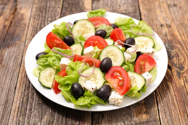 Vegetables and olives salad — Stock Photo, Image