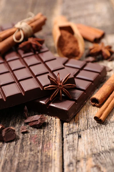 Sweet chocolate bars with spices — Stock Photo, Image