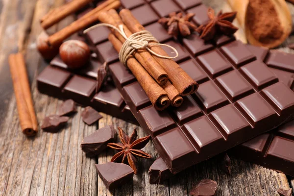 Sweet chocolate bars with spices — Stock Photo, Image