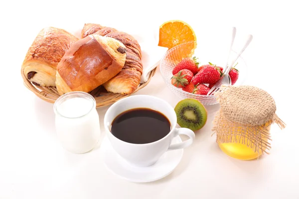 Frühstück mit Kaffeetasse und Croissants — Stockfoto