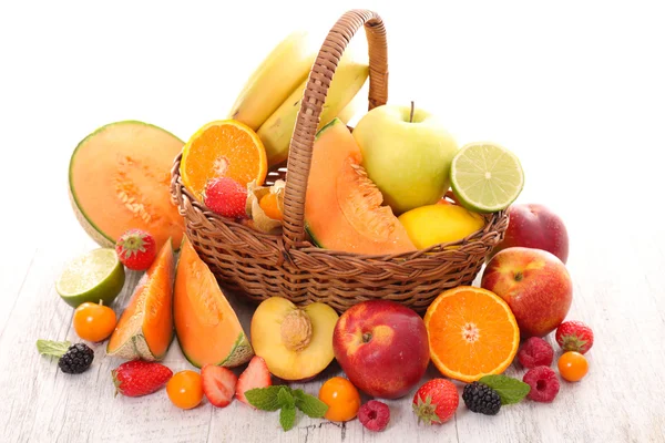 Assorted fruits in basket — Stock Photo, Image