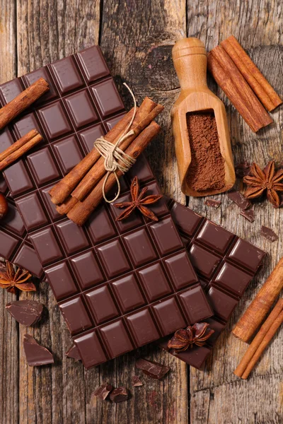 Chocolate bars and spices — Stock Photo, Image