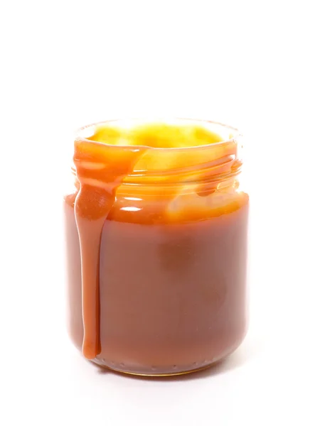 Caramel dessert in jar — Stock Photo, Image