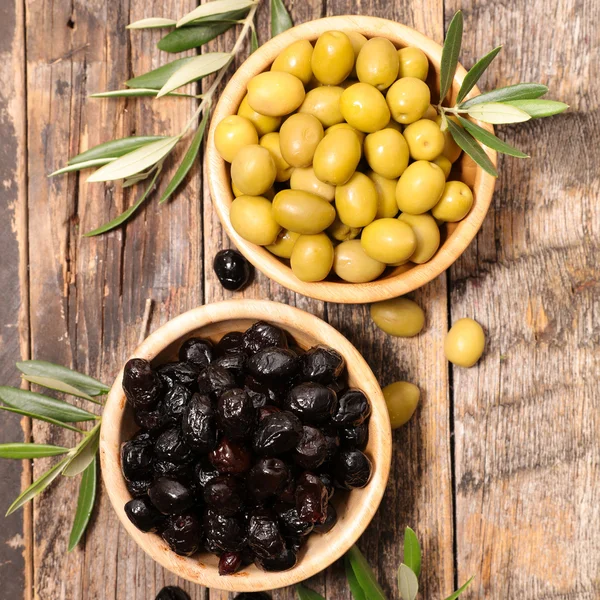 Black and green olives in bowls Stock Photo by ©studioM 157777910
