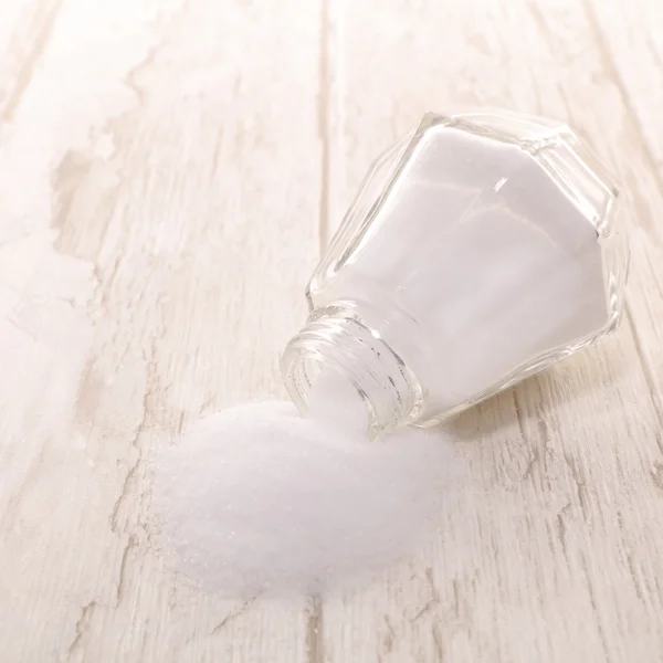 Sugar or salt with container — Stock Photo, Image