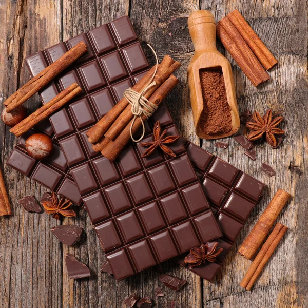 Chocolate bars and spices — Stock Photo, Image