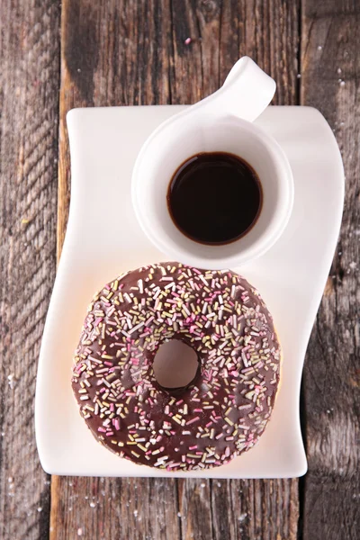 Coffee cup and donut — Stock Photo, Image