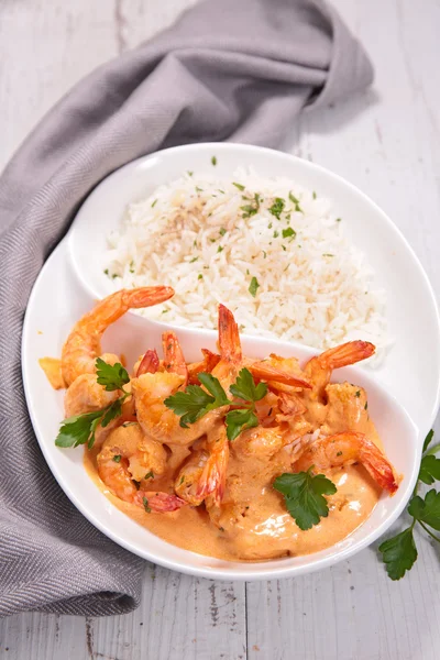 Shrimps and spicy soup — Stock Photo, Image