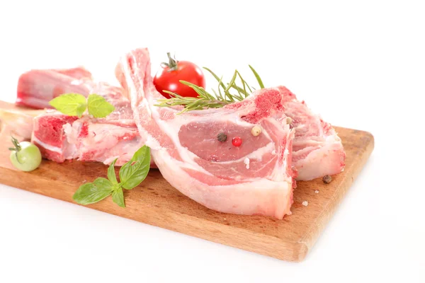 Raw lamb chops with rosemary — Stock Photo, Image