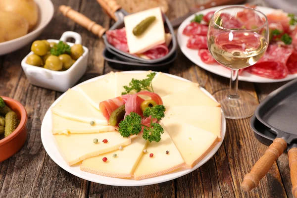 Raclette party with ingredients — Stock Photo, Image