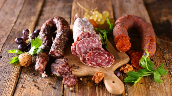 Assorted French Salami Wooden Board Royalty Free Stock Photos