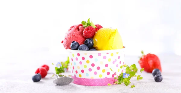 ice cream in bowl with fresh fruits