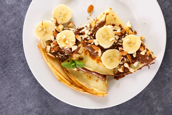 crepe with chocolate spread,  nuts and banana