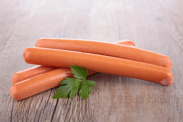 Sausages with parsley — Stock Photo, Image