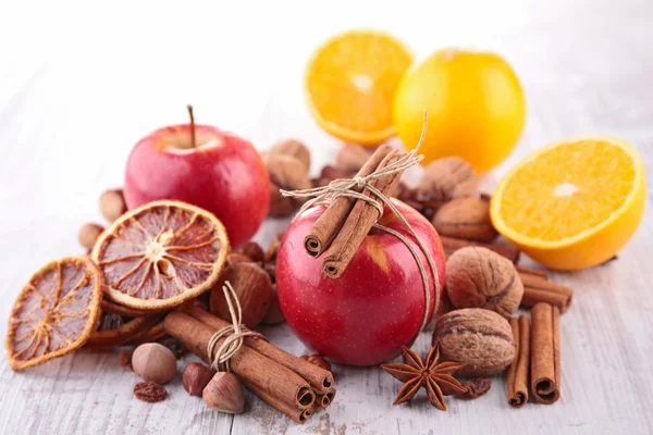 Apple, orange and spices — Stock Photo, Image