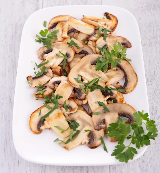 Grilled mushrooms and parsley — Stock Photo, Image