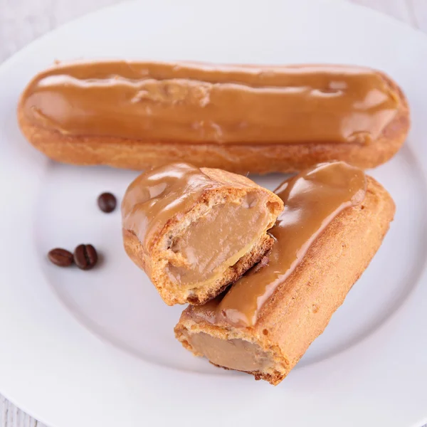 Coffee french eclair, pastry — Stock Photo, Image