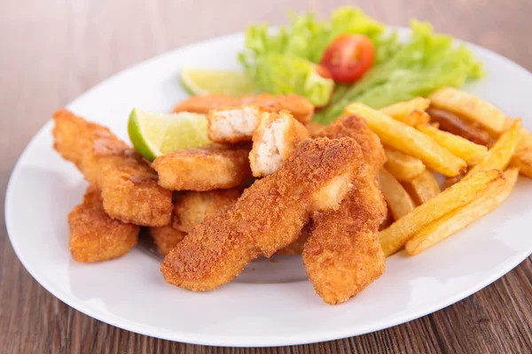 Breaded meat and french fries — Stock Photo, Image