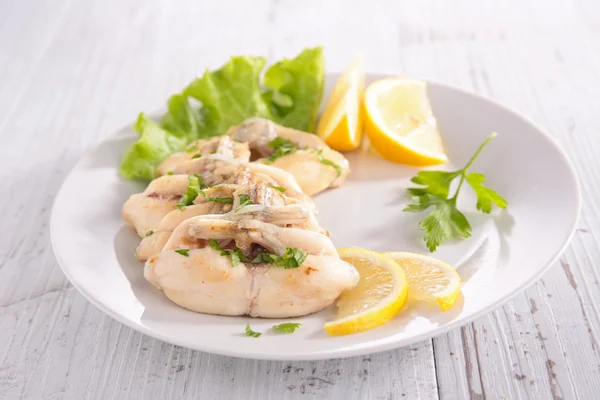 Frog legs with parsley and salad — Stock Photo, Image