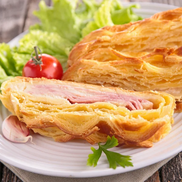 Puff pastry with cheese and bacon — Stock Photo, Image