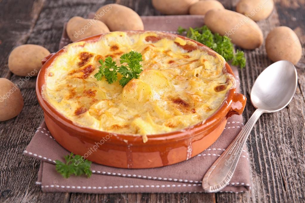 Tasty fresh potato gratin — Stock Photo © studioM 60580807