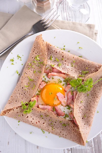 Crepe and eggs — Stock Photo, Image