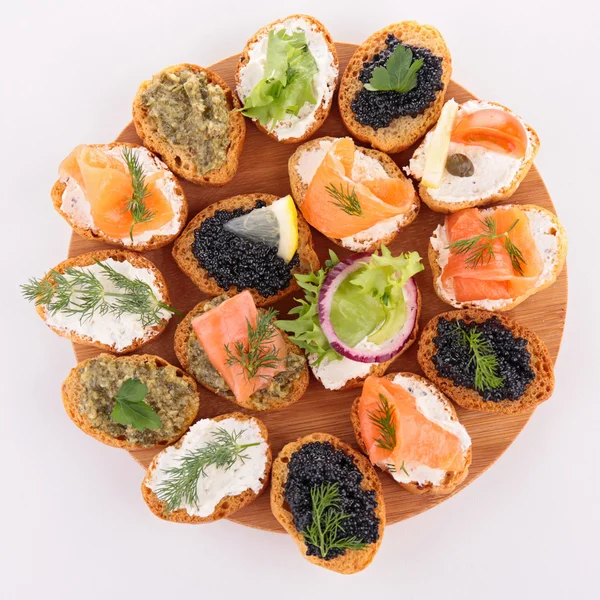 Assortment of different canape — Stock Photo, Image