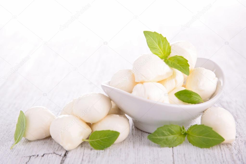 Mozzarella with basil in bowl