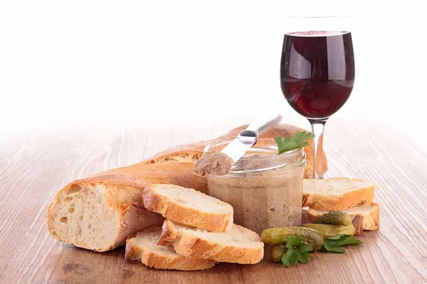 Bread, meat spread and red wine — Stock Photo, Image